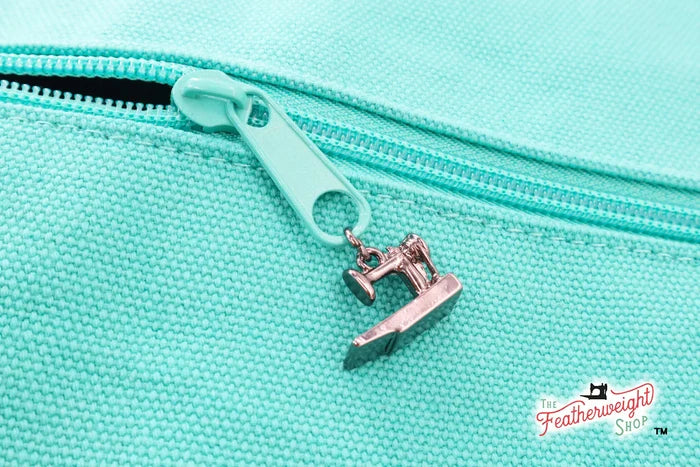 Featherweight Zipper Pull and Charm